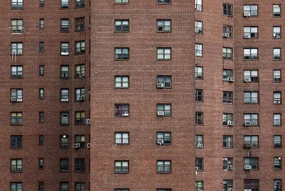 A view of the facade of a New York City Housing Authority development.